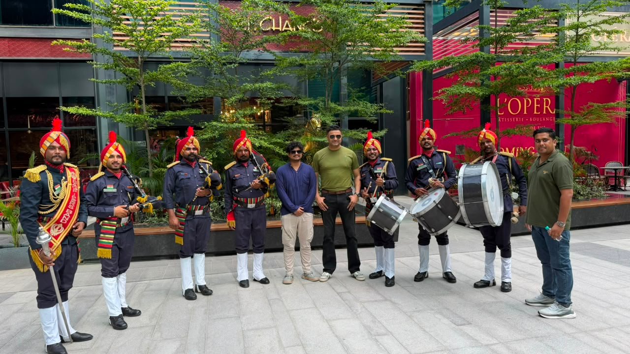 Band members with event organizers